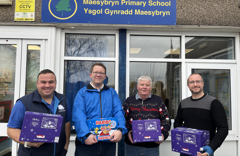 Joel with fellow community councillors, Brian James, Karl Johnson and Sam Trask outside Maesybryn Primary School