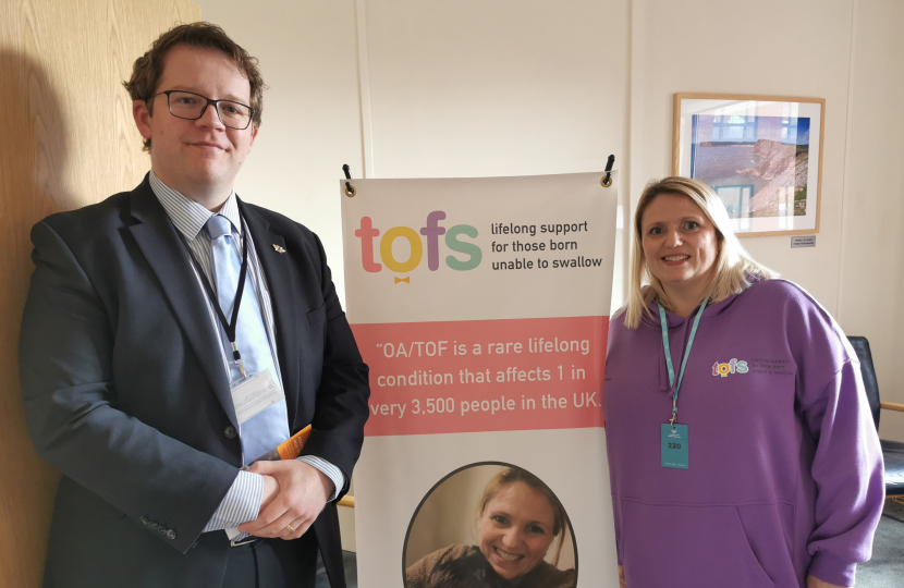 Joel James with Naomi Webborn from the TOFS charity in the Senedd
