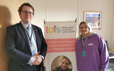 Joel James with Naomi Webborn from the TOFS charity in the Senedd